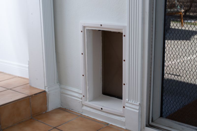 Dog Door Installation in a Wooden Wall
